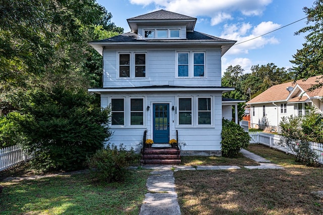 view of front of house with a front lawn