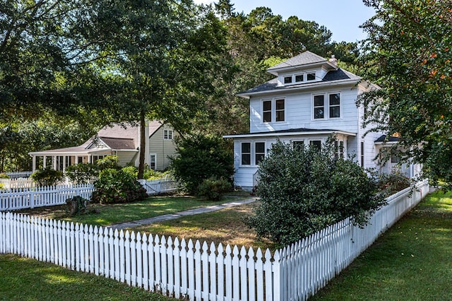 view of front of home with a front yard