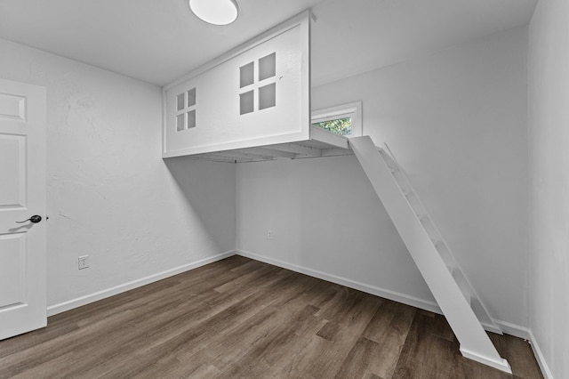 interior space with dark hardwood / wood-style flooring