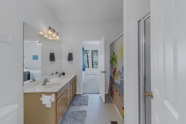 207 Pelican Way, Reedville, VA 22539 - ensuite bathroom featuring ensuite bath, a sink, toilet, and double vanity