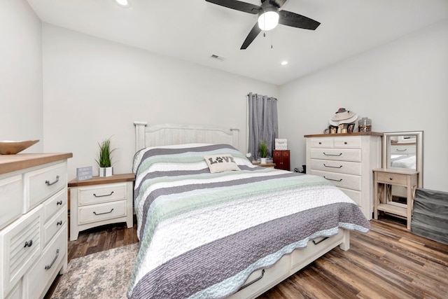 bedroom featuring dark hardwood / wood-style floors and ceiling fan