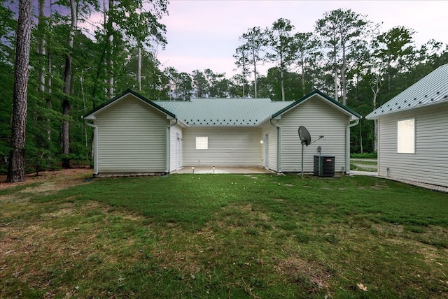 126 Pioneer Trl, Hague, VA 22469 - rear view of house with a yard, a patio, and a metal roof