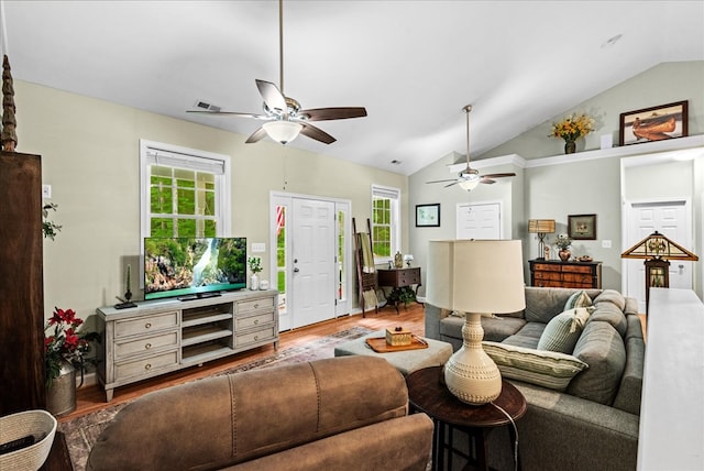 126 Pioneer Trl, Hague, VA 22469 - living area featuring plenty of natural light, wood finished floors, lofted ceiling, and ceiling fan