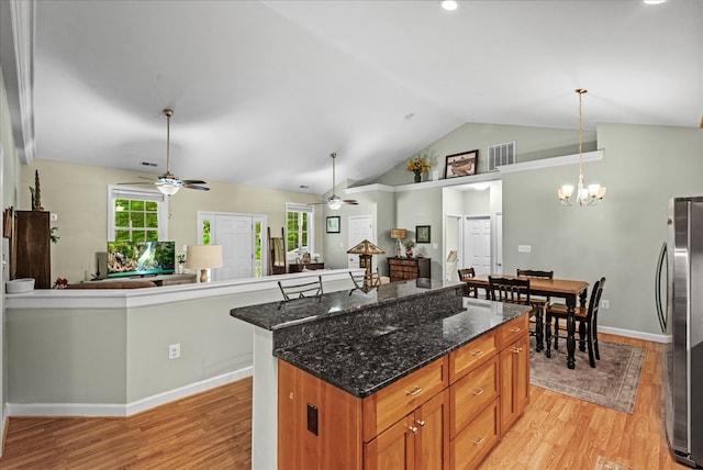 126 Pioneer Trl, Hague, VA 22469 - kitchen with freestanding refrigerator, ceiling fan, open floor plan, light wood-style flooring, and recessed lighting
