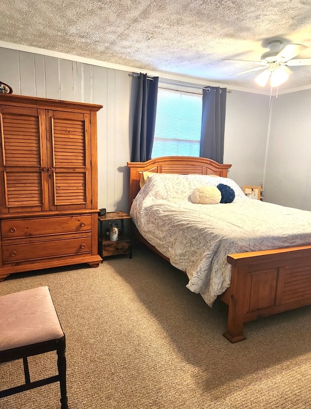 237 Hickory Ln, Reedville, VA 22539 - carpeted bedroom with a ceiling fan and a textured ceiling
