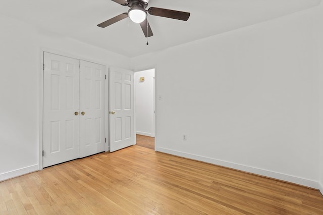 383 Monroe St, Montross, VA 22520 - unfurnished bedroom featuring baseboards, light wood-style flooring, ceiling fan, and a closet