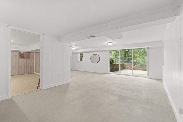 383 Monroe St, Montross, VA 22520 - unfurnished living room with ornamental molding, concrete floors, wood walls, and baseboards
