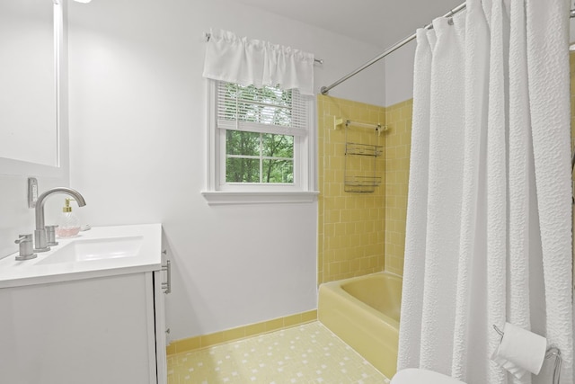 383 Monroe St, Montross, VA 22520 - full bathroom featuring vanity, shower / bathtub combination with curtain, and baseboards