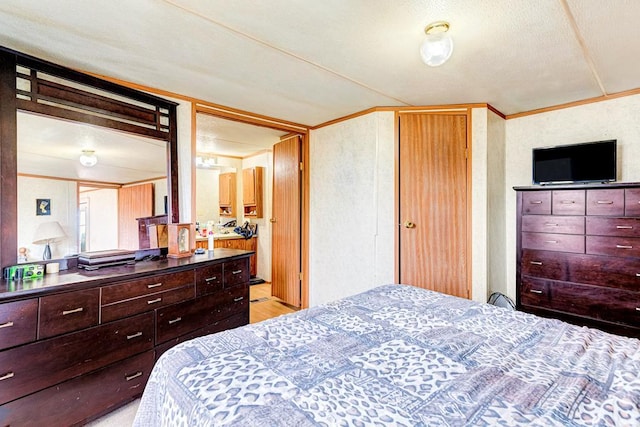 bedroom featuring ornamental molding