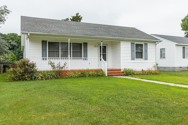 725 Cralle Ave, Tappahannock, VA 22560 - single story home featuring a porch, a front lawn, and roof with shingles