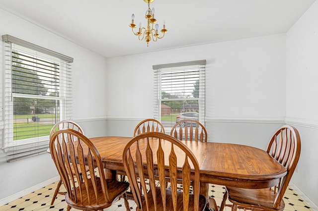 725 Cralle Ave, Tappahannock, VA 22560 - dining space with light flooring and a chandelier