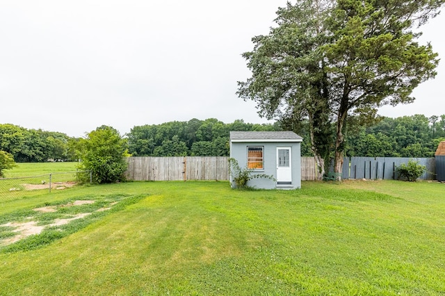 725 Cralle Ave, Tappahannock, VA 22560 - fenced backyard with an outdoor structure