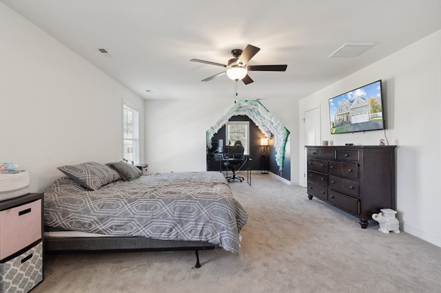 carpeted bedroom with ceiling fan