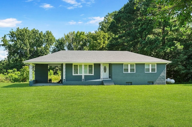 ranch-style home featuring a front yard