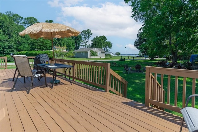 430 Pine Tree Rd, Center Cross, VA 22437 - wooden deck featuring a lawn and outdoor dining space