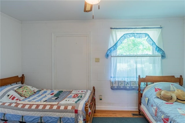 430 Pine Tree Rd, Center Cross, VA 22437 - bedroom featuring crown molding, wood finished floors, and ceiling fan