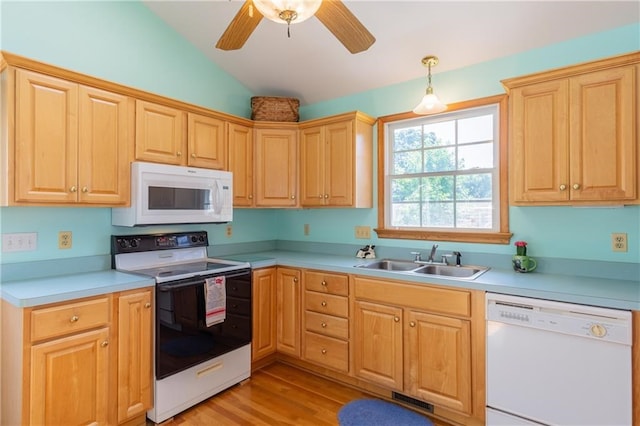 430 Pine Tree Rd, Center Cross, VA 22437 - kitchen with white appliances, lofted ceiling, light countertops, light brown cabinetry, and light wood finished floors