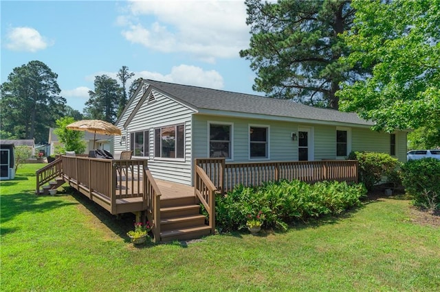 430 Pine Tree Rd, Center Cross, VA 22437 - rear view of property featuring a lawn and a deck