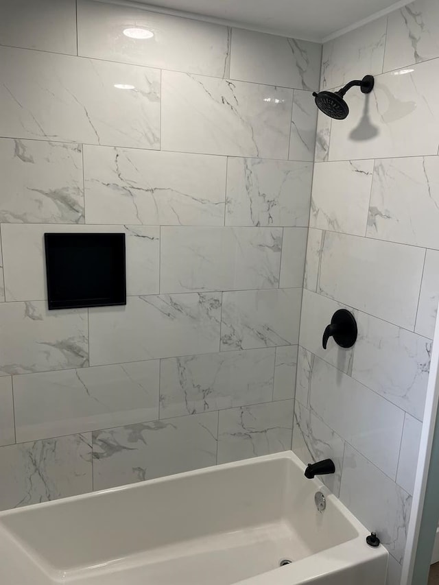 full bathroom with shower / tub combination