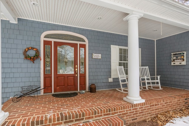 entrance to property with covered porch