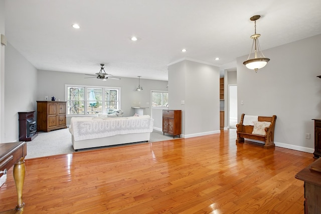 bedroom featuring recessed lighting, light wood-style flooring, and baseboards