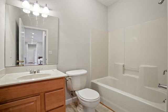 full bath featuring vanity,  shower combination, and toilet