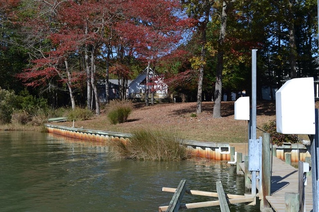 view of dock with a water view