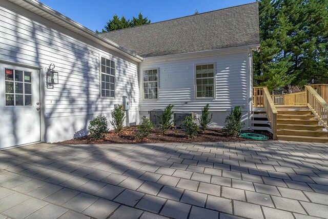 exterior space featuring a wooden deck