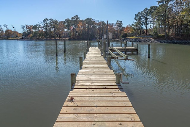 view of dock with a water view