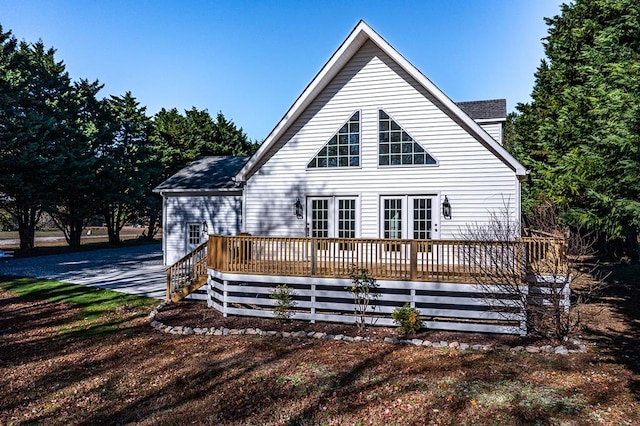 rear view of house with a deck