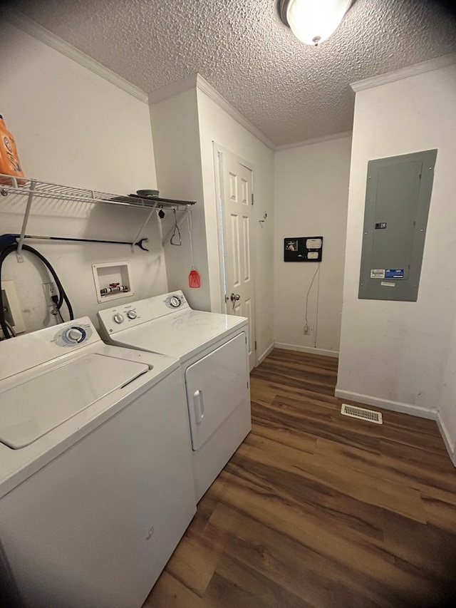 laundry area with electric panel, crown molding, independent washer and dryer, a textured ceiling, and dark hardwood / wood-style flooring