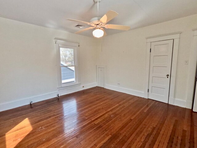 bedroom featuring a notable chandelier and hardwood / wood-style flooring