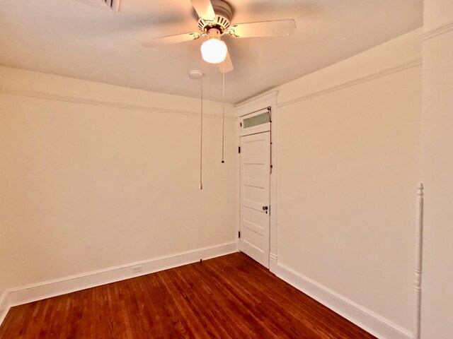 unfurnished sunroom featuring ceiling fan