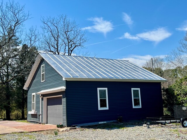 rear view of house with a sunroom