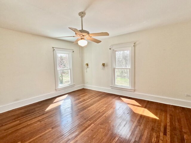 unfurnished room featuring ceiling fan and hardwood / wood-style flooring