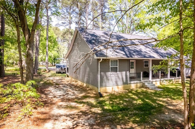 146 Portal Dr, Montross, VA 22520 - back of house with roof with shingles and a porch