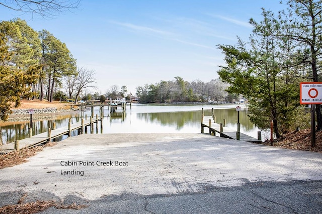 dock area featuring a water view