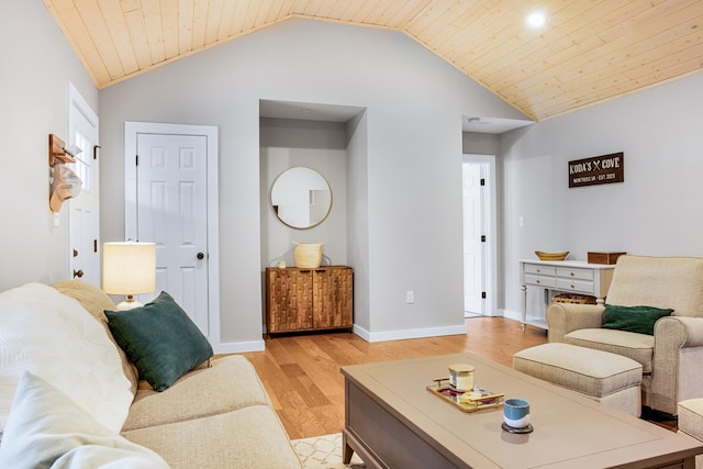 living area with lofted ceiling, wooden ceiling, light wood-style flooring, and baseboards