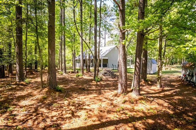 146 Portal Dr, Montross, VA 22520 - view of yard with an outbuilding and a shed