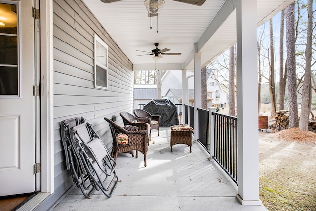 view of patio featuring ceiling fan