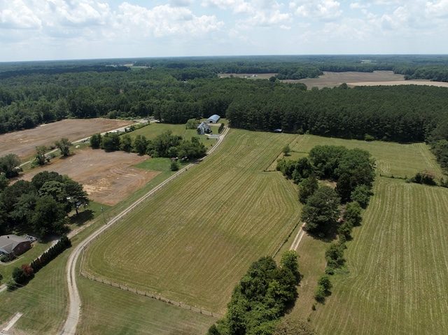 birds eye view of property featuring a rural view