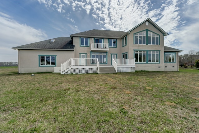 284 Palmer Dr, Lottsburg, VA 22511 - back of house featuring a balcony, stucco siding, roof with shingles, and a lawn