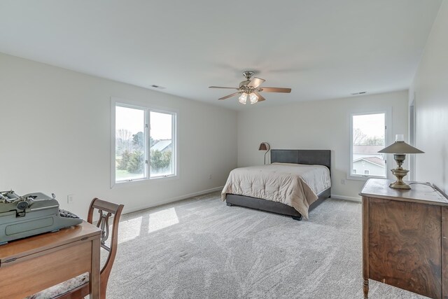 284 Palmer Dr, Lottsburg, VA 22511 - bedroom featuring visible vents, light carpet, baseboards, and ceiling fan