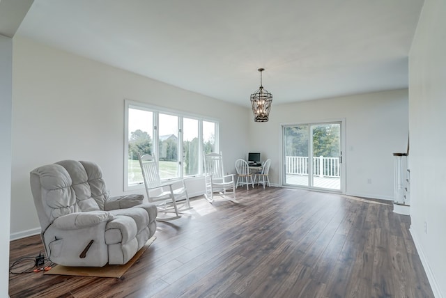 284 Palmer Dr, Lottsburg, VA 22511 - sitting room with dark wood-type flooring, baseboards, and a notable chandelier