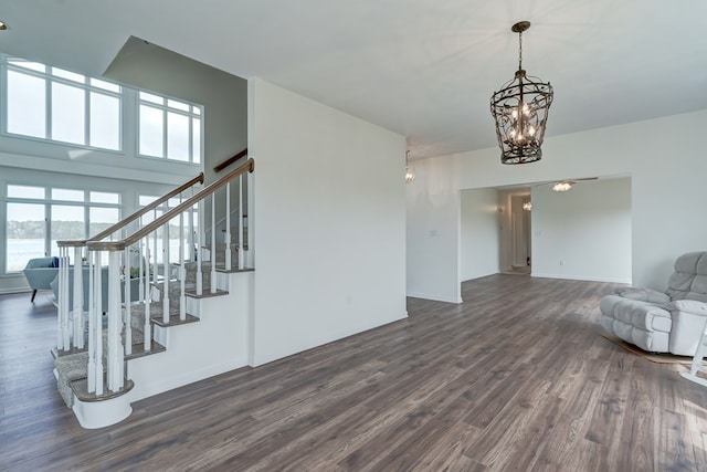 284 Palmer Dr, Lottsburg, VA 22511 - interior space with baseboards, a notable chandelier, and wood finished floors