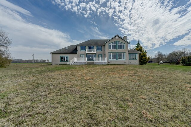 284 Palmer Dr, Lottsburg, VA 22511 - view of front of house with stucco siding, a chimney, and a front yard