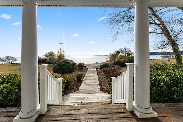 view of community with a water view