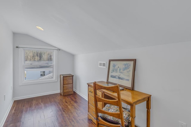 bonus room with dark wood-type flooring and vaulted ceiling