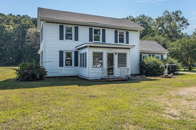 view of front of house with a front lawn