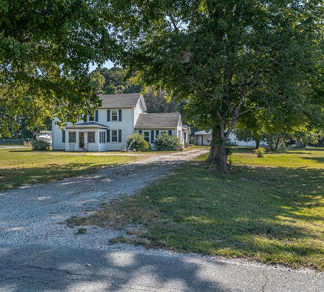 view of front of home with a front yard